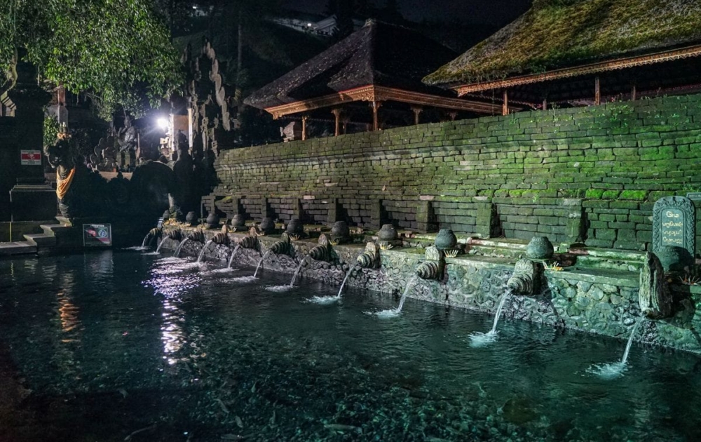 Holy Springs at Pura Tirta Empul Temple in Bali at night